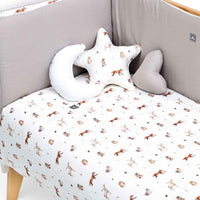 Protector cuna 70x140 cm (reversible) estampado bosque · Taiga 627-148