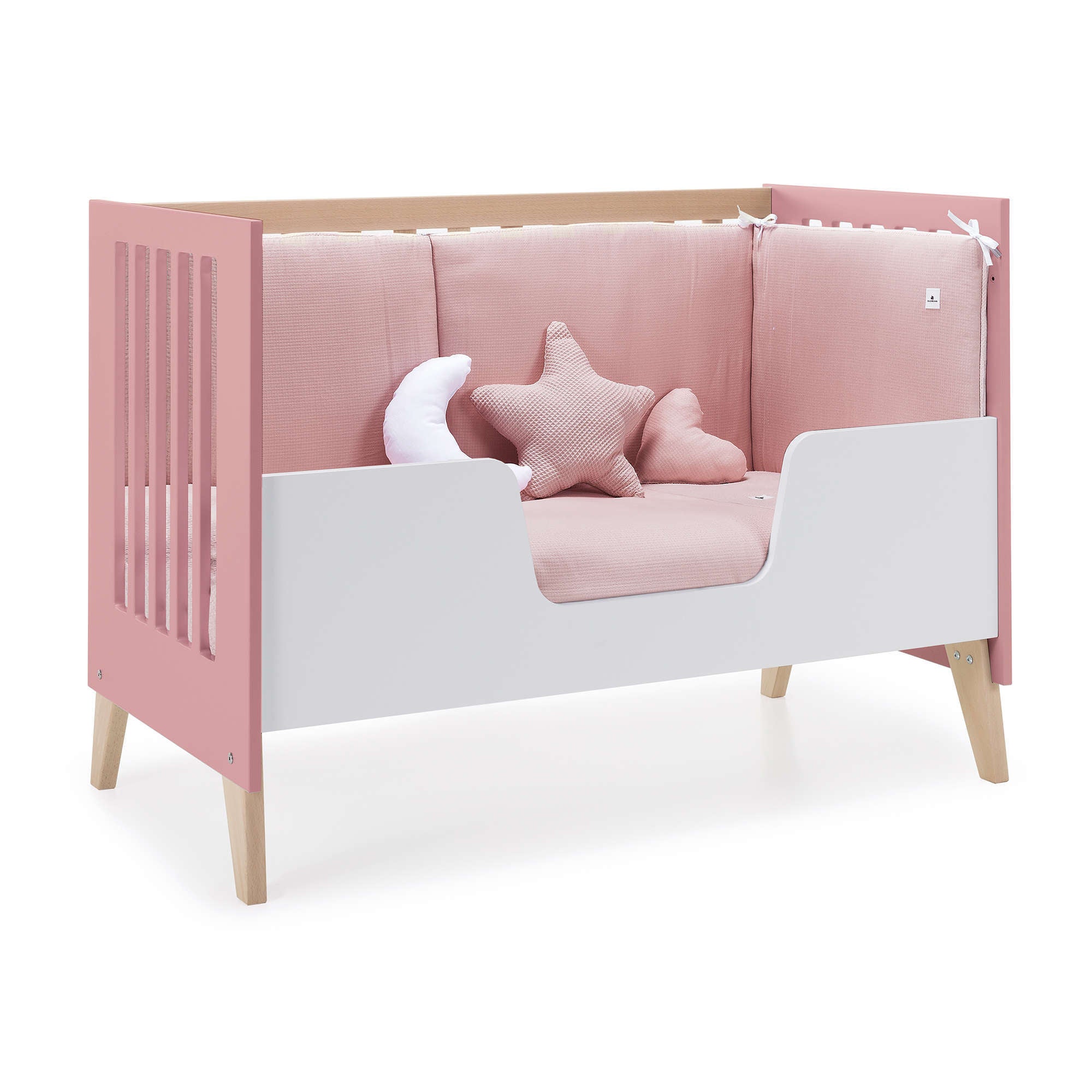 etapa de camita infantil de la cuna evolutiva Nexor en color rosa y madera