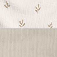 Cesta almacenaje infantil redonda hojas beige · Nandina 614-116