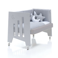 Cuna OMNI convertible en 5 etapas con kit colecho y suplemento de espuma