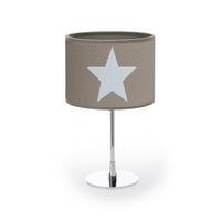 Lámpara color beige con estrella estampada en tela plastificada color beige